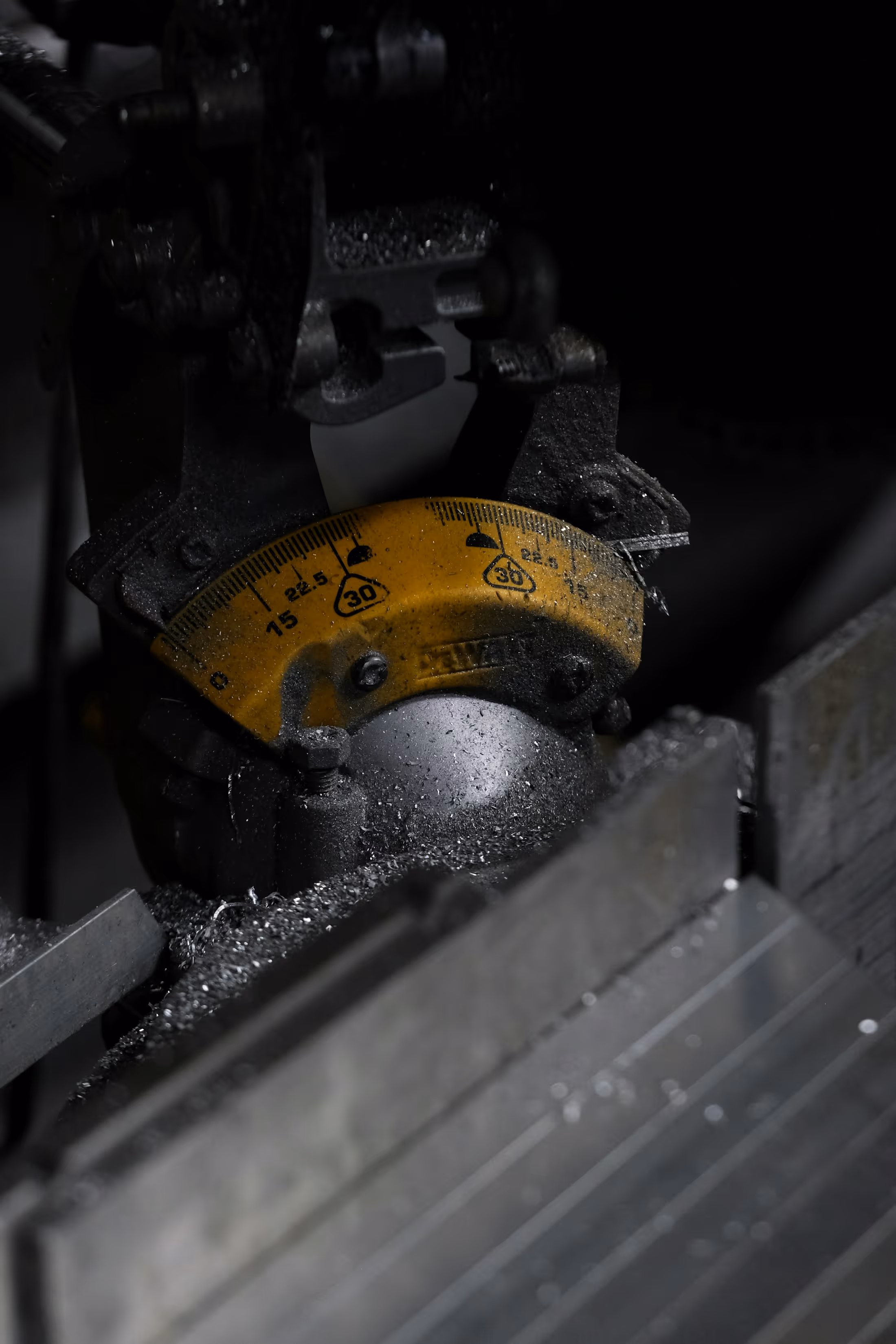 Close view of metalworking machinery and swarf in a workshop